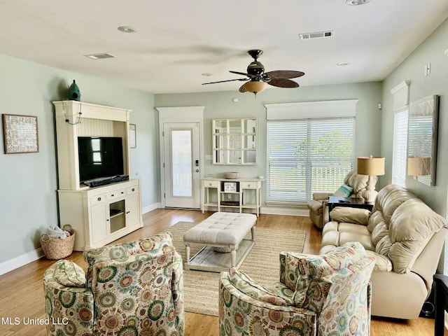 4011 S Nassau St, Bay Saint Louis, MS 39520 - living area with a ceiling fan, light wood finished floors, baseboards, and recessed lighting