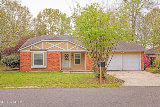 view of front facade with an attached garage, concrete driveway, brick siding, a front lawn, and roof with shingles