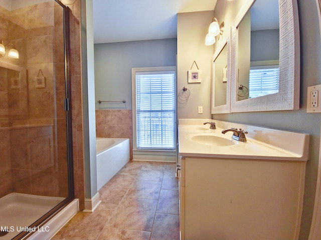 64 Oak Alley Ln, Long Beach, MS 39560 - bathroom featuring a stall shower, a wealth of natural light, a garden tub, and a sink