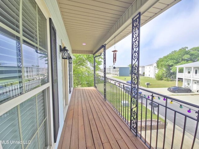64 Oak Alley Ln, Long Beach, MS 39560 - deck with a porch and a residential view