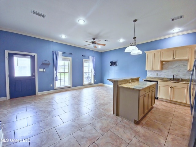 64 Oak Alley Ln, Long Beach, MS 39560 - kitchen with light brown cabinetry, visible vents, and ornamental molding