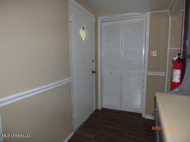 hall featuring dark hardwood / wood-style flooring
