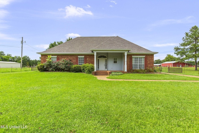 380 Green Acres Dr, Canton, MS 39046 - view of front of property with a shingled roof and brick siding