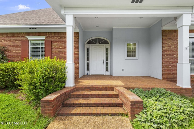 380 Green Acres Dr, Canton, MS 39046 - property entrance with brick siding and roof with shingles