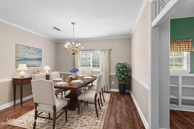 380 Green Acres Dr, Canton, MS 39046 - dining space featuring a chandelier, wood finished floors, and crown molding