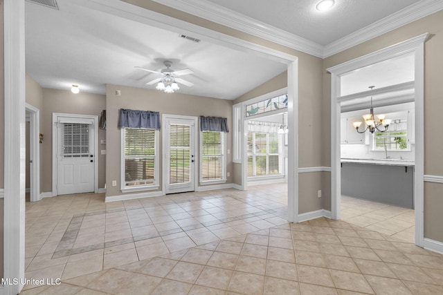 380 Green Acres Dr, Canton, MS 39046 - spare room featuring light tile patterned floors, a chandelier, lofted ceiling, ornamental molding, and ceiling fan
