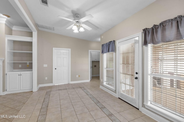 380 Green Acres Dr, Canton, MS 39046 - unfurnished bedroom with light tile patterned flooring, access to exterior, ceiling fan, and inlaid floor details