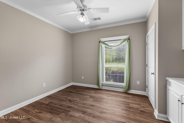 380 Green Acres Dr, Canton, MS 39046 - unfurnished room featuring dark wood-type flooring, ceiling fan, and crown molding