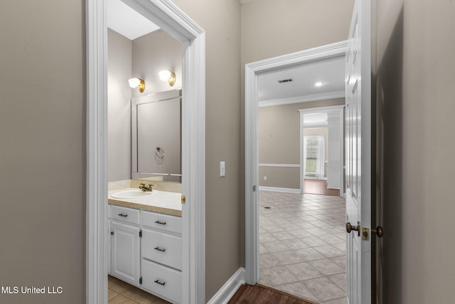 380 Green Acres Dr, Canton, MS 39046 - bathroom with ornamental molding, vanity, and tile patterned floors