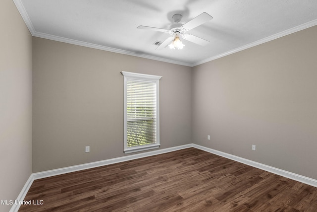 380 Green Acres Dr, Canton, MS 39046 - empty room featuring dark wood-style flooring, ceiling fan, and ornamental molding