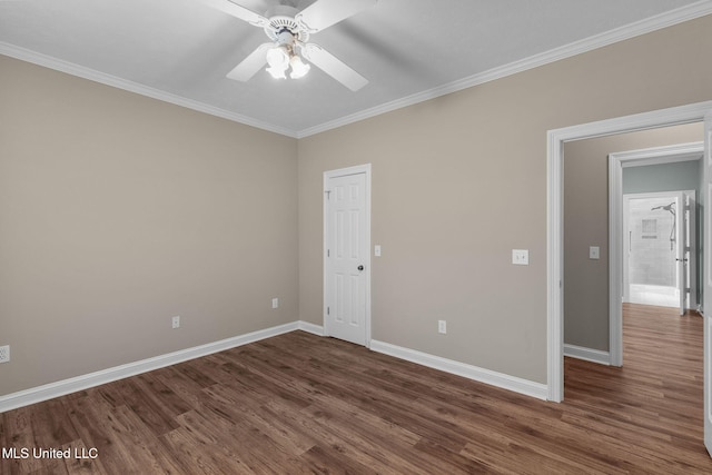 380 Green Acres Dr, Canton, MS 39046 - empty room with dark wood-type flooring, ornamental molding, and a ceiling fan