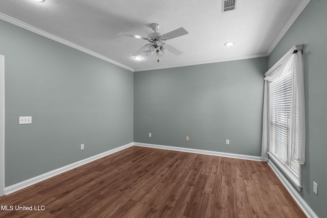 380 Green Acres Dr, Canton, MS 39046 - empty room with dark wood-style flooring, crown molding, ceiling fan, and recessed lighting