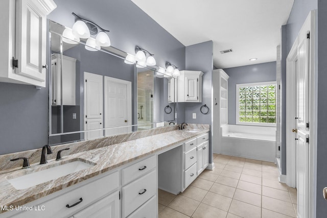 380 Green Acres Dr, Canton, MS 39046 - full bath with double vanity, tile patterned flooring, and a bath