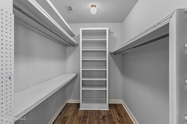 380 Green Acres Dr, Canton, MS 39046 - spacious closet featuring dark wood-type flooring