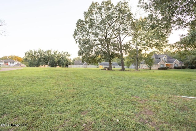 view of yard featuring fence