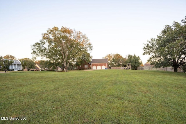view of yard featuring a garage