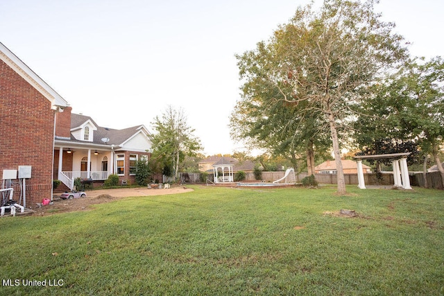 view of yard featuring a porch