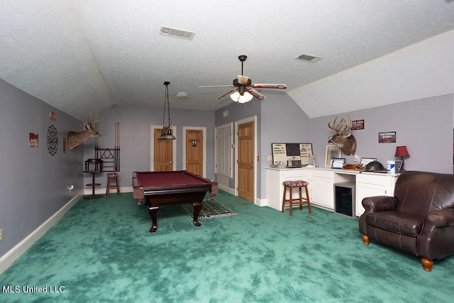 recreation room with a textured ceiling, ceiling fan, vaulted ceiling, dark carpet, and billiards