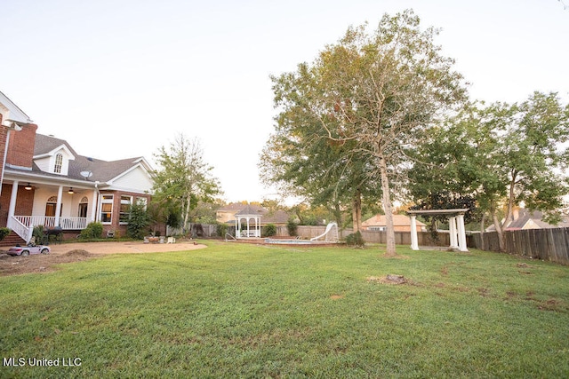 view of yard featuring a porch