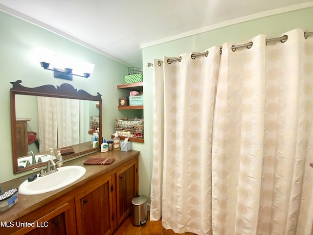 bathroom featuring vanity and hardwood / wood-style flooring