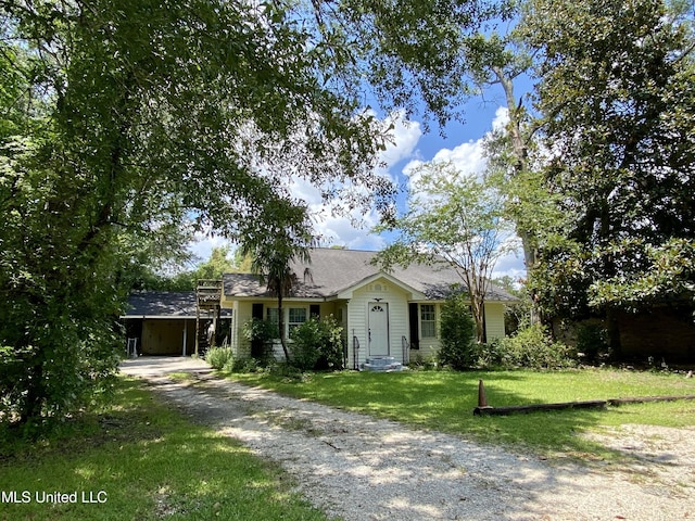 1903 Circle Dr, Picayune, MS 39466 - ranch-style house featuring driveway, roof with shingles, and a front yard