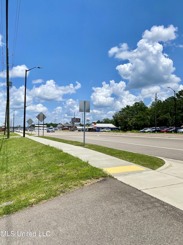 1903 Circle Dr, Picayune, MS 39466 - view of road featuring street lights, sidewalks, and traffic signs