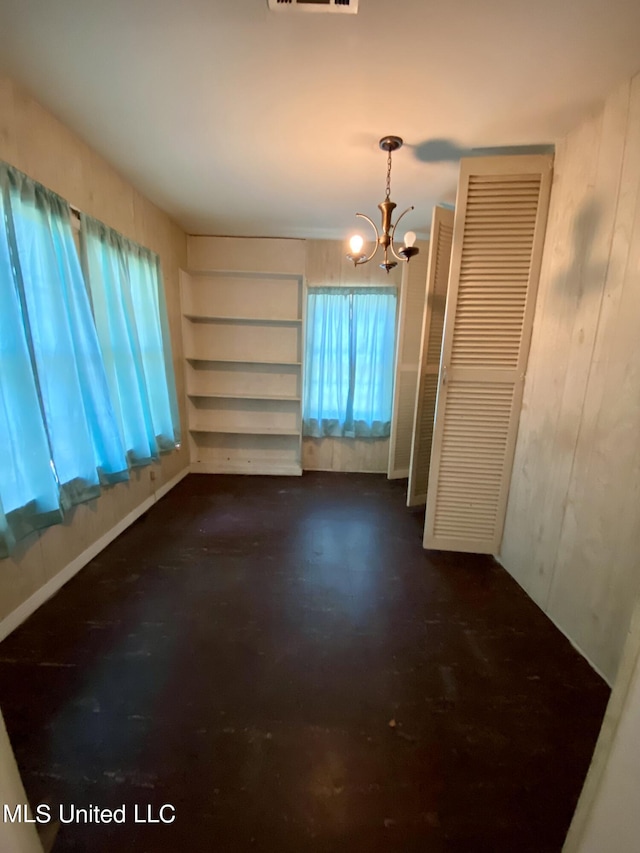 1903 Circle Dr, Picayune, MS 39466 - unfurnished dining area with visible vents and a notable chandelier