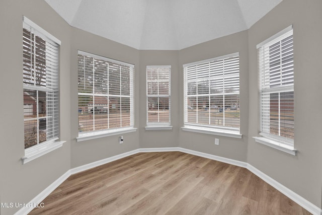 interior space featuring vaulted ceiling