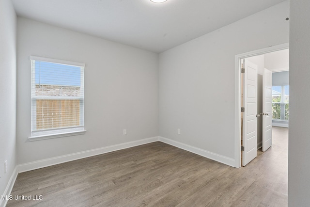 5006 Sand Dollar Dr, Long Beach, MS 39560 - empty room with wood finished floors