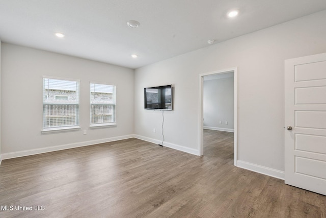 5006 Sand Dollar Dr, Long Beach, MS 39560 - unfurnished room featuring wood finished floors, recessed lighting, and a smoke detector