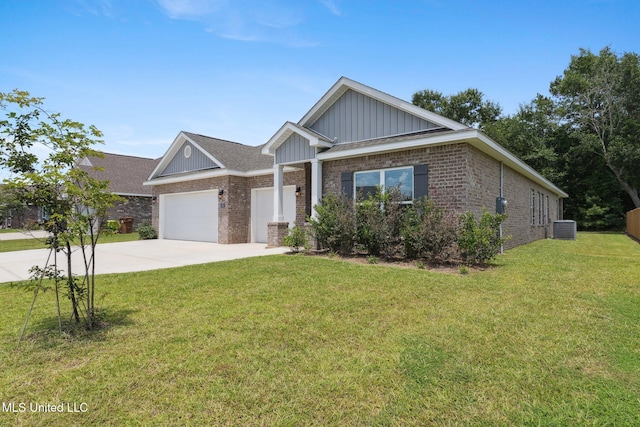 5006 Sand Dollar Dr, Long Beach, MS 39560 - view of front of property featuring concrete driveway, brick siding, board and batten siding, and an attached garage