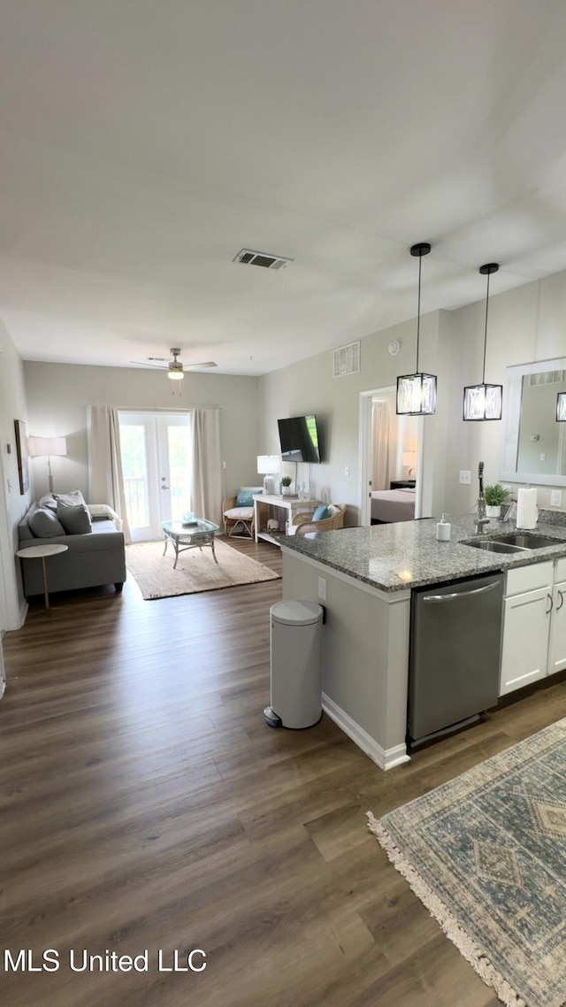 204 Town Center Dr Unit 31, Oxford, MS 38655 - kitchen with dishwasher, open floor plan, white cabinetry, light stone countertops, and dark wood finished floors