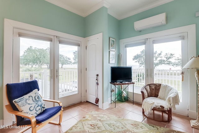 living area with ornamental molding, light tile patterned flooring, and a wall unit AC