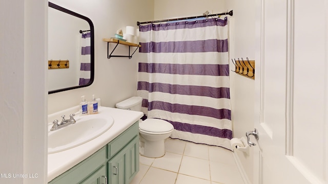 bathroom with vanity, tile patterned flooring, a shower with curtain, and toilet