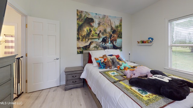 bedroom with light wood-style flooring