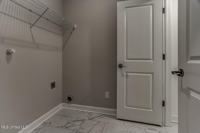 laundry room with marble finish floor, laundry area, baseboards, and hookup for an electric dryer