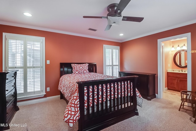 bedroom with connected bathroom, ceiling fan, light carpet, and ornamental molding