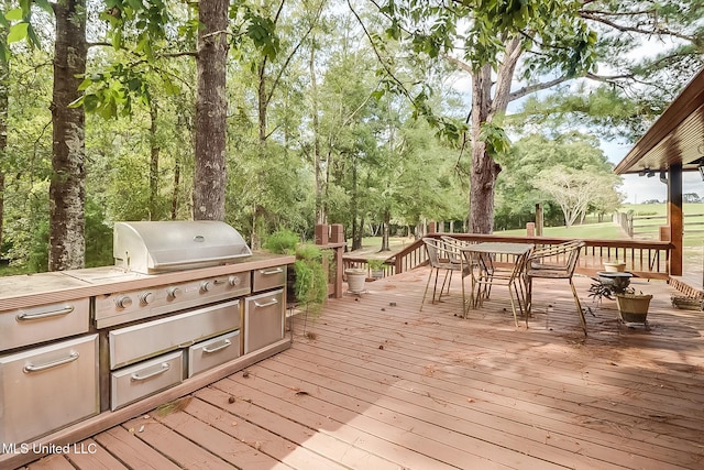 wooden deck with grilling area