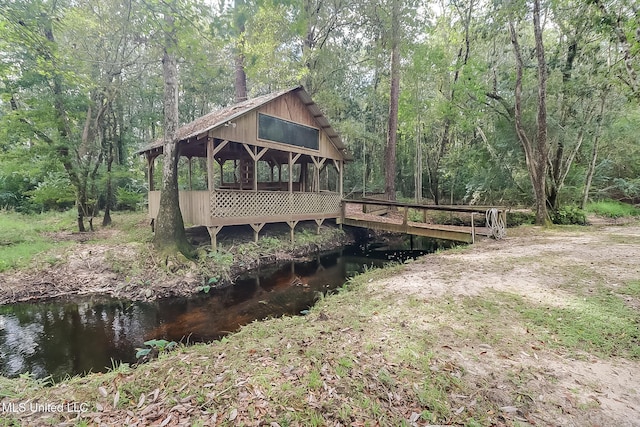 exterior space featuring a wooden deck