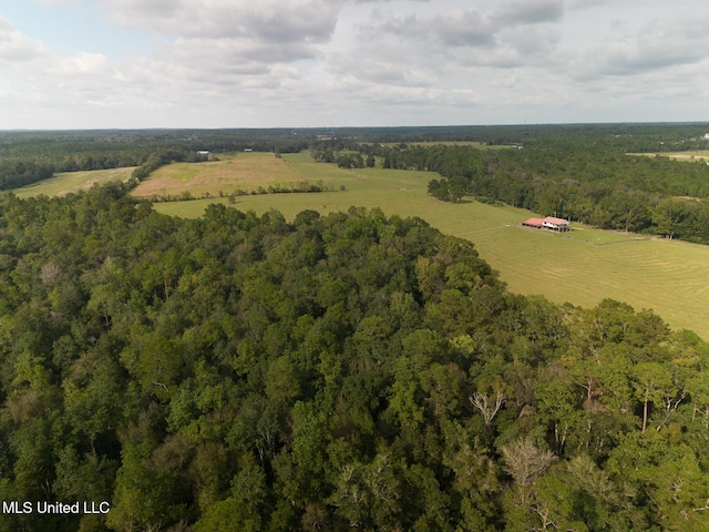 birds eye view of property featuring a rural view