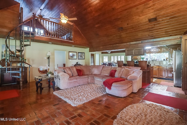 living room with ceiling fan, high vaulted ceiling, and wood ceiling