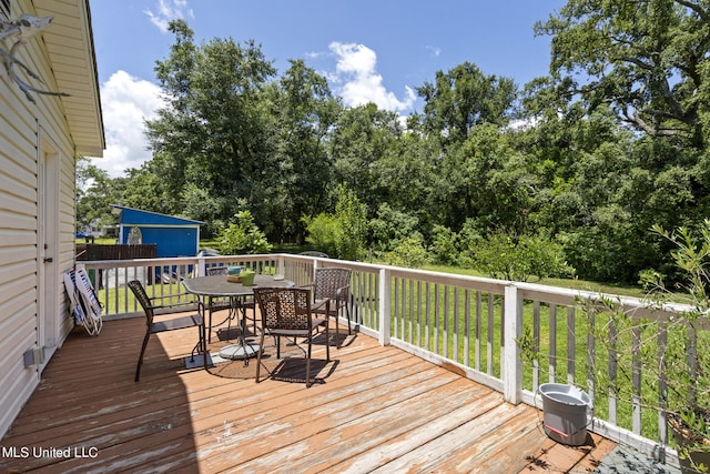 deck with an outdoor structure