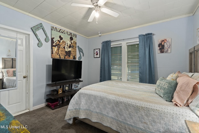 bedroom featuring ornamental molding, carpet floors, and ceiling fan