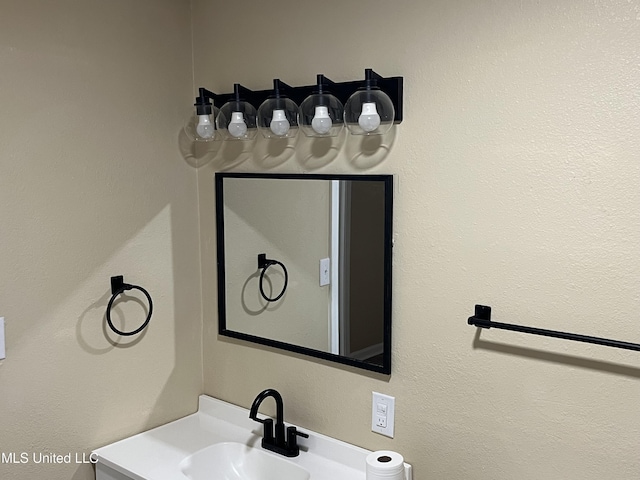 7701 Harold Ave, Moss Point, MS 39563 - bathroom featuring vanity