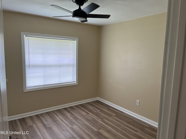 7701 Harold Ave, Moss Point, MS 39563 - spare room with wood finished floors and a ceiling fan