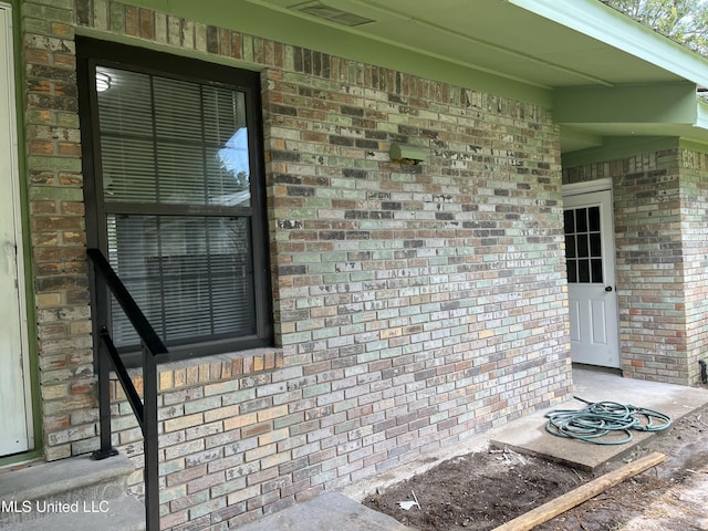 7701 Harold Ave, Moss Point, MS 39563 - property entrance featuring brick siding