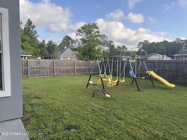 view of yard with a playground