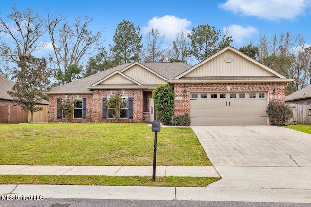 view of front of property featuring a front yard and a garage