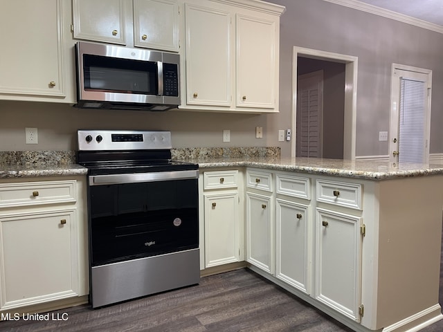 kitchen with light stone countertops, ornamental molding, stainless steel appliances, white cabinets, and dark hardwood / wood-style floors