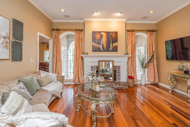 116 Hidden Hills Dr, Madison, MS 39110 - living area featuring wood finished floors, a fireplace, recessed lighting, and crown molding